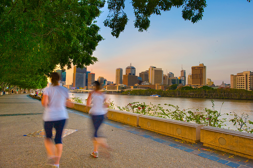 Ladies jogging along promenade